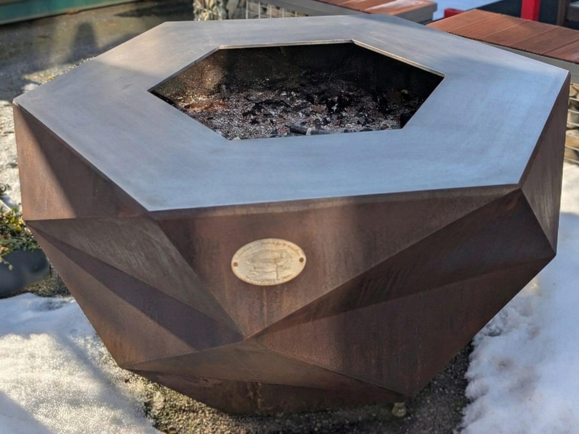 Iron Icon fire bowl with corten patina, hexagonal fire opening and stainless steel rim